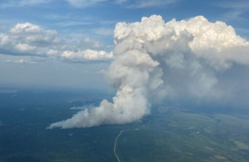 aerial photo of gray pyrocumulus smoke cloud forming over fire in Saskatchewan, Canada